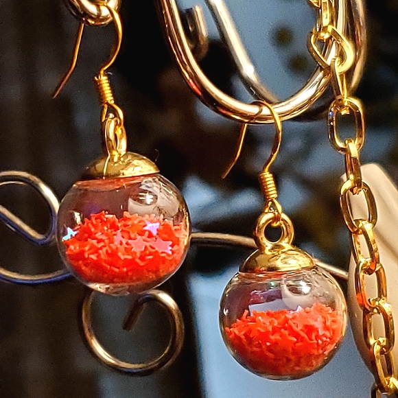 Glass ball pendant earrings with red sparkle stars. 3 pair available. - Picture 1 of 3